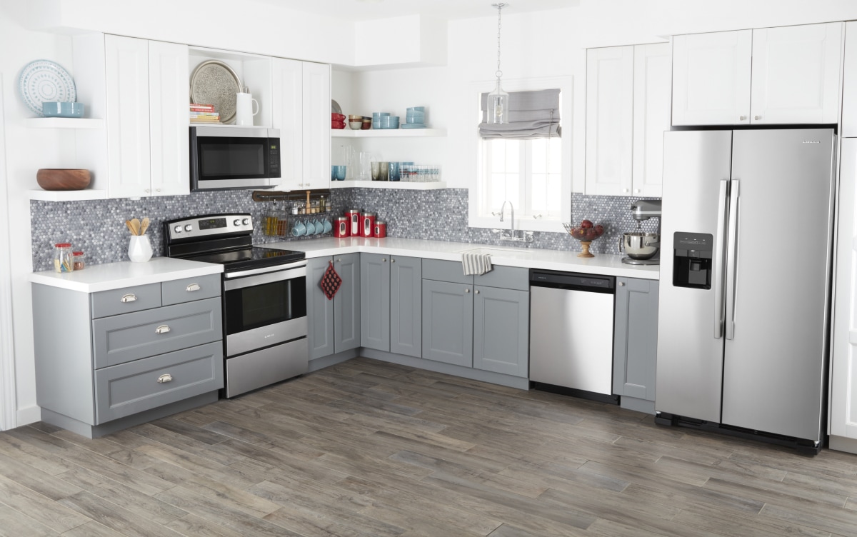 Amana® appliances set in gray cabinetry
