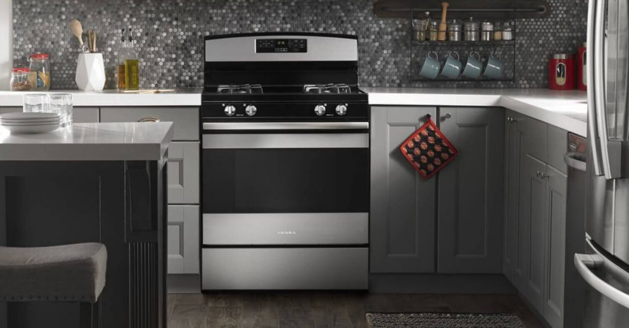 An Amana® range installed in a clean, fully stocked kitchen. An Amana® range installed in a clean, fully stocked kitchen.