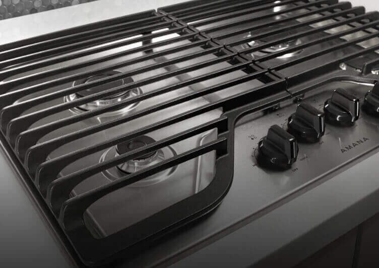 A close-up of the cooktop's controls. A close-up of the cooktop's controls.