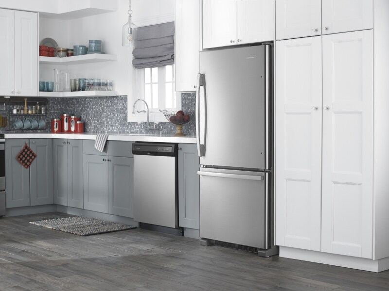 Amana® appliances set in white and grey cabinetry Amana® appliances set in white and grey cabinetry
