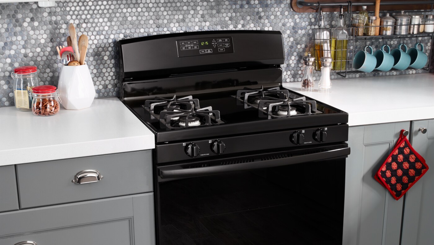 Black Amana® range set in black cabinetry  Black Amana® range set in black cabinetry