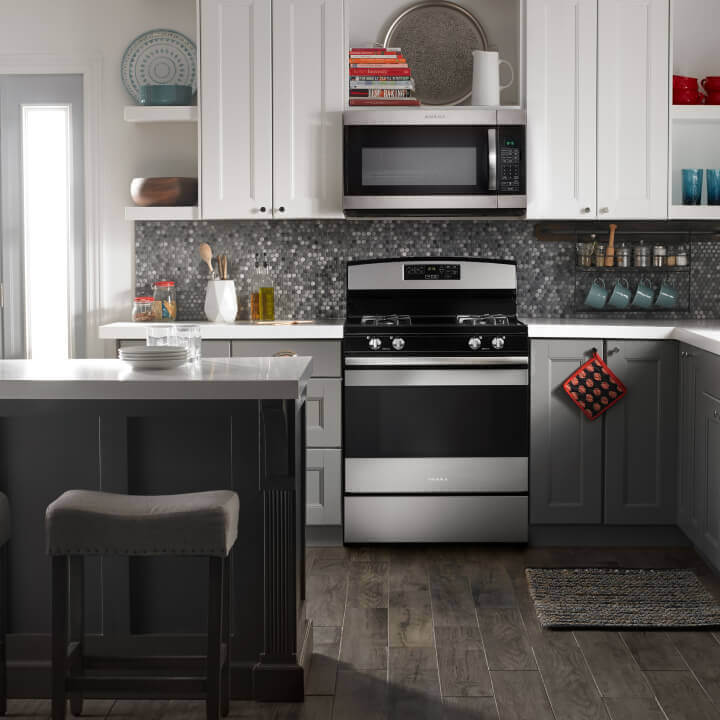 Amana® range and microwave in kitchen