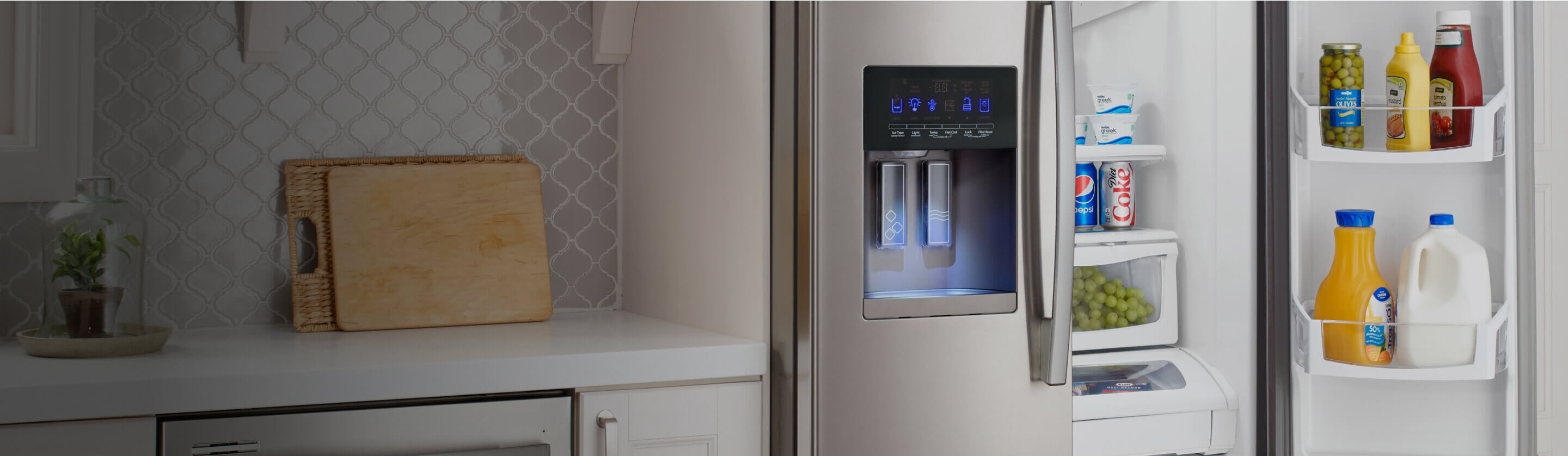 An Amana® side by side refrigerator with a door open. 