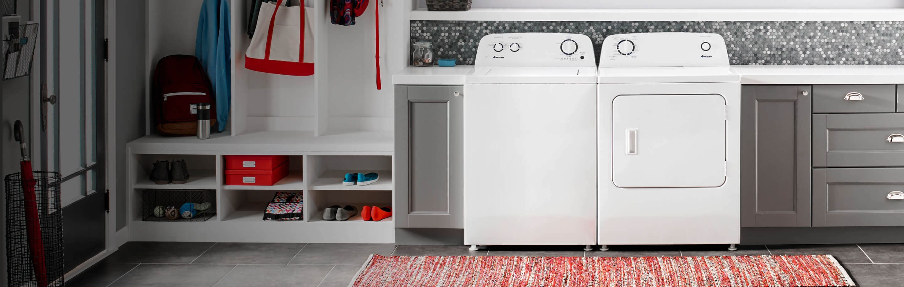Amana® washer and dryer pair in laundry room