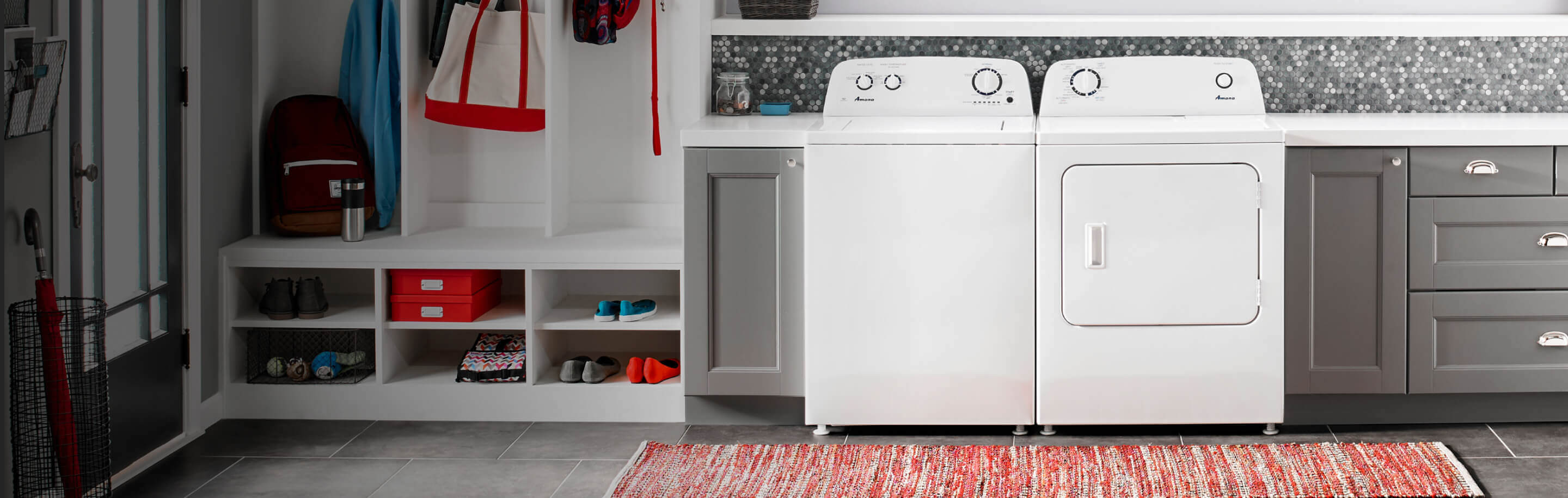 Amana® washer and dryer pair in laundry room