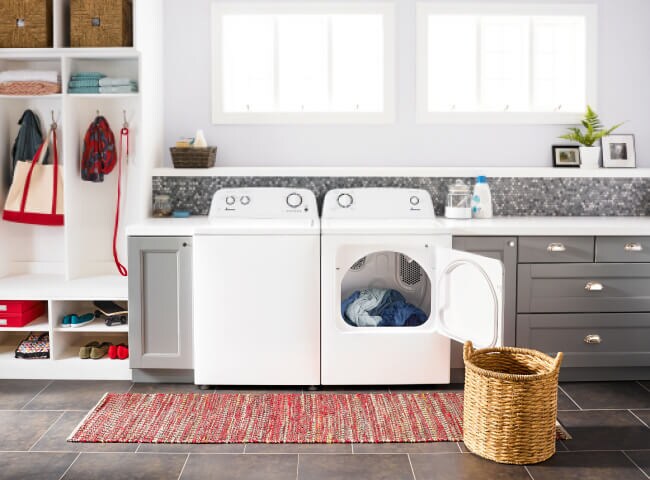 Amana® washer and dryer pair with dryer door open
