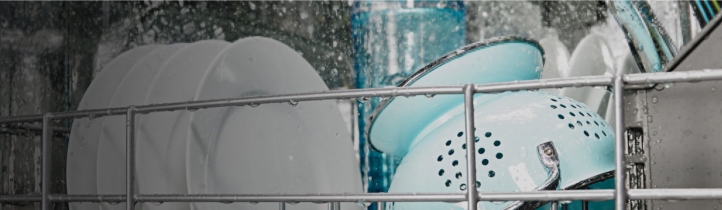 Close up of dishes in Amana® dishwasher