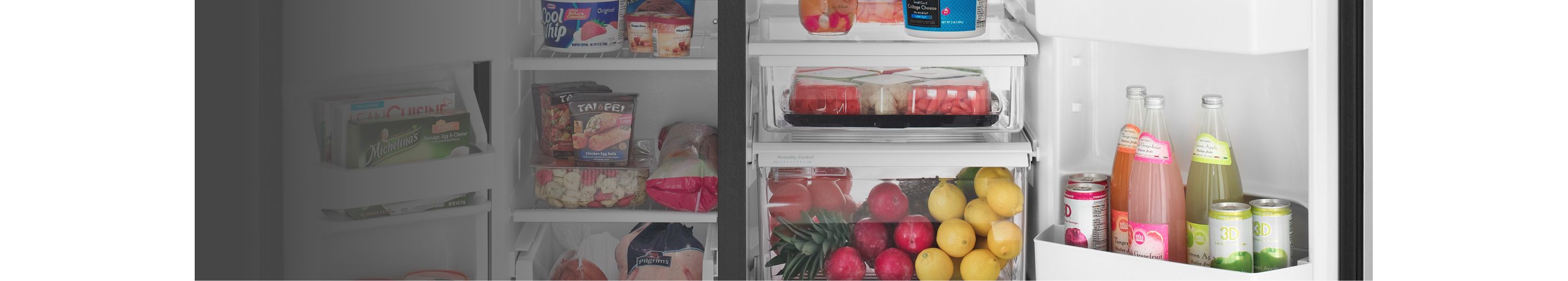 An Amana® refrigerator with both doors open.