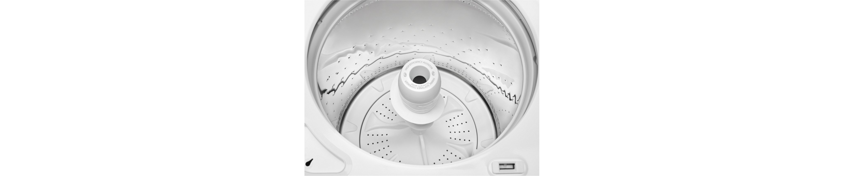 Open white top loading washer with an agitator