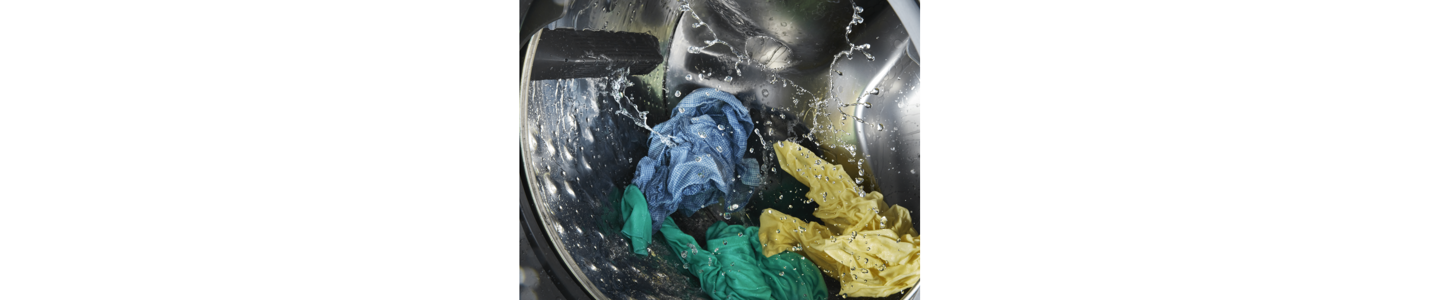 Clothes being washed inside a washing machine
