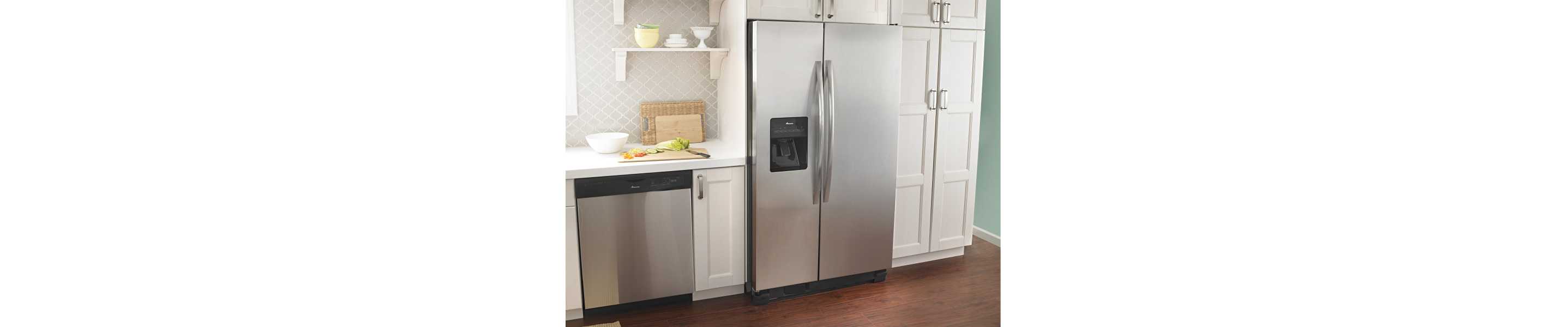 Stainless steel Amana® refrigerator and dishwasher