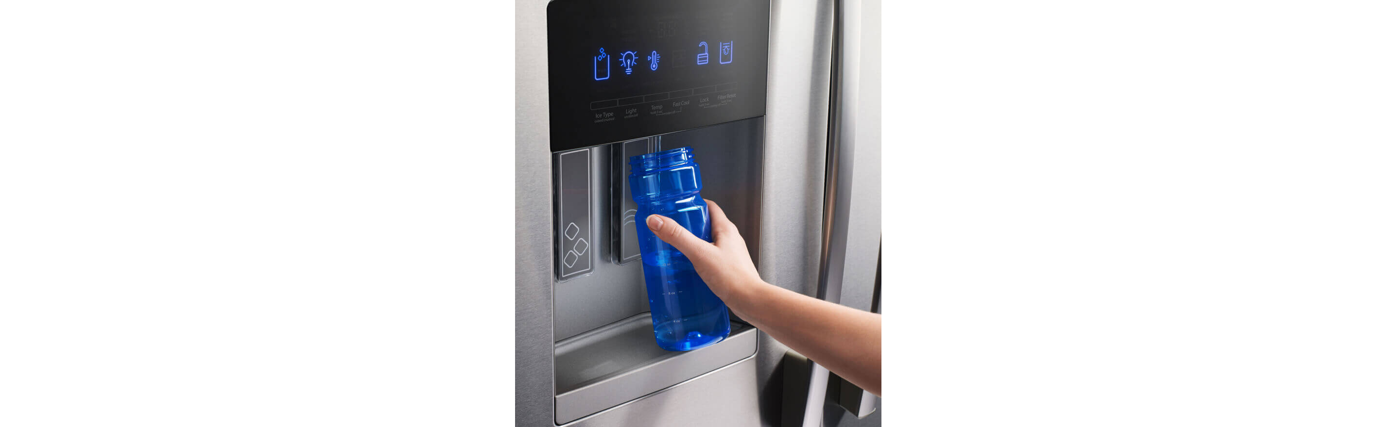 Person filling a water bottle from a refrigerator water dispenser