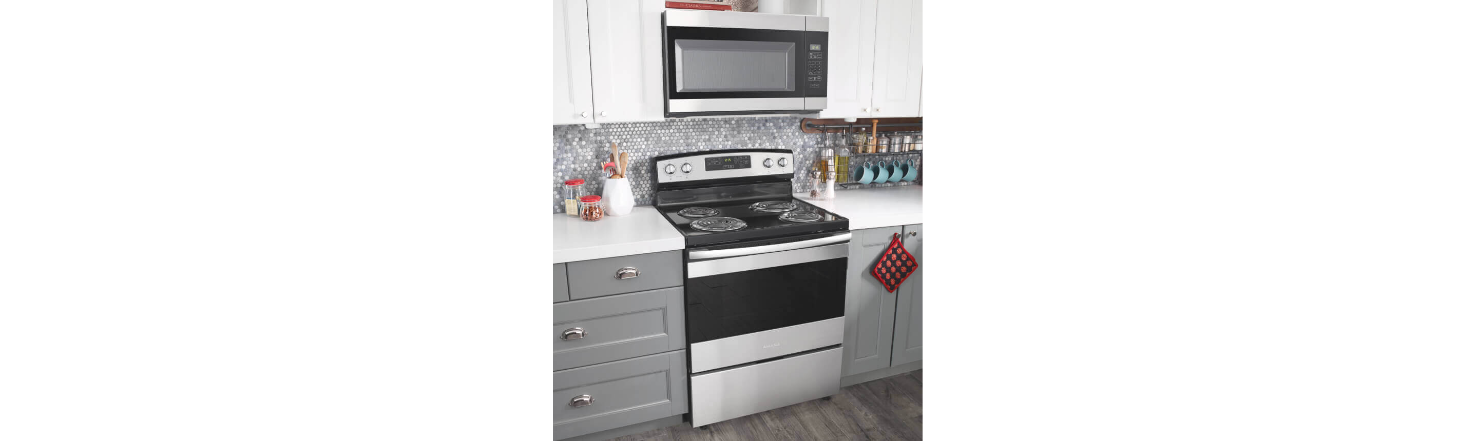 Amana® range and microwave in kitchen